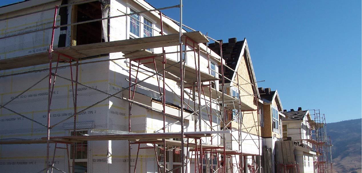This image shows a housing structure with Altas sheathing options being applied.