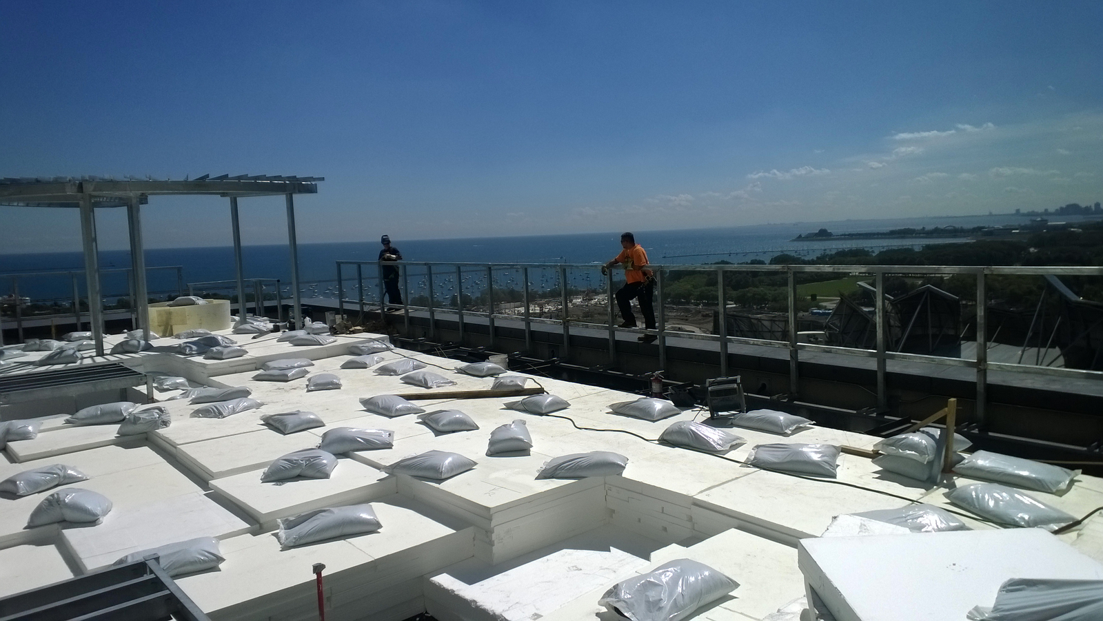 Crew members installing Atlas Geofoam for green roof application